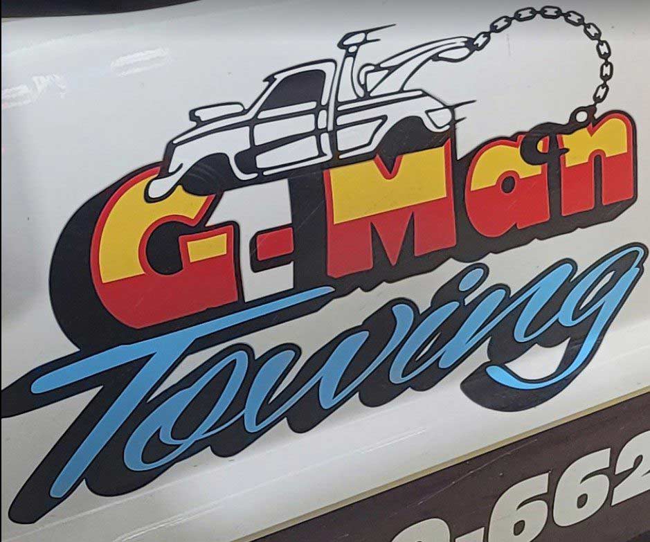 G-Man Towing Truck Logo Painted In The Car
